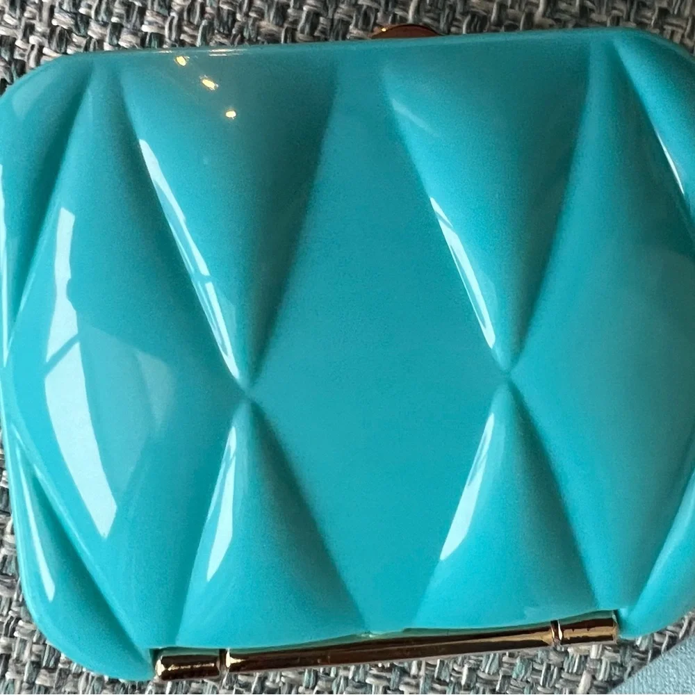 39. Miu Miu Turquoise Compact Case